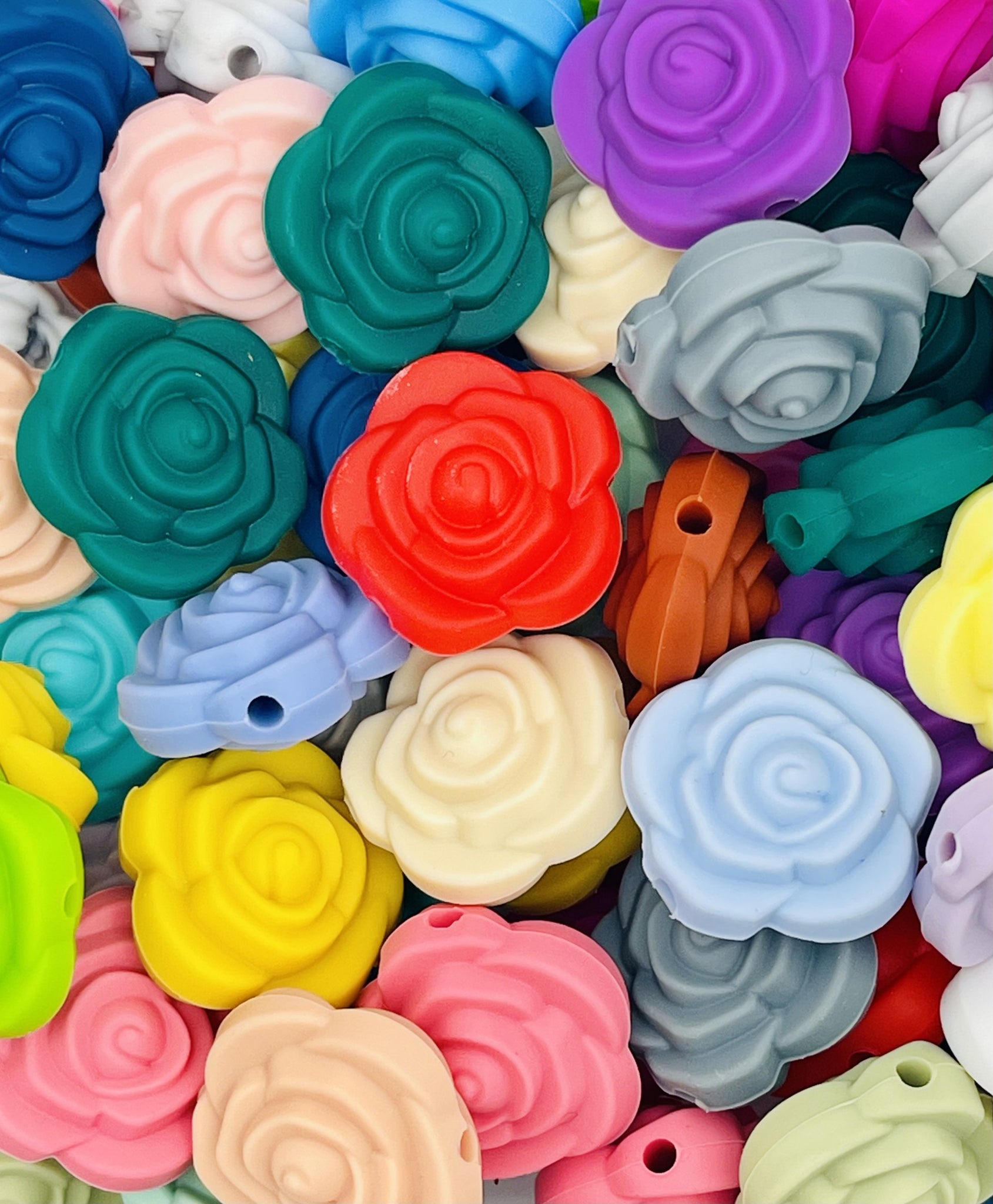 Silicone Rose Bead Collection: Colorful Soft Touch Flowers for DIY Jewelry & Crafts.