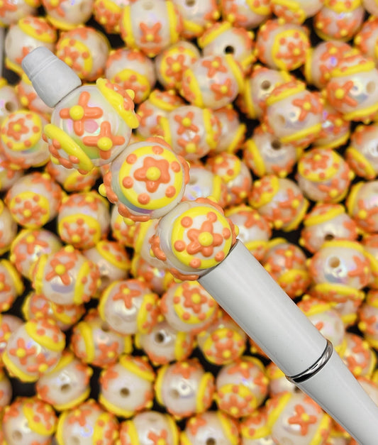 Hand-Painted Floral Bead Collection: Orange & Yellow Accent Beads for DIY Crafts.