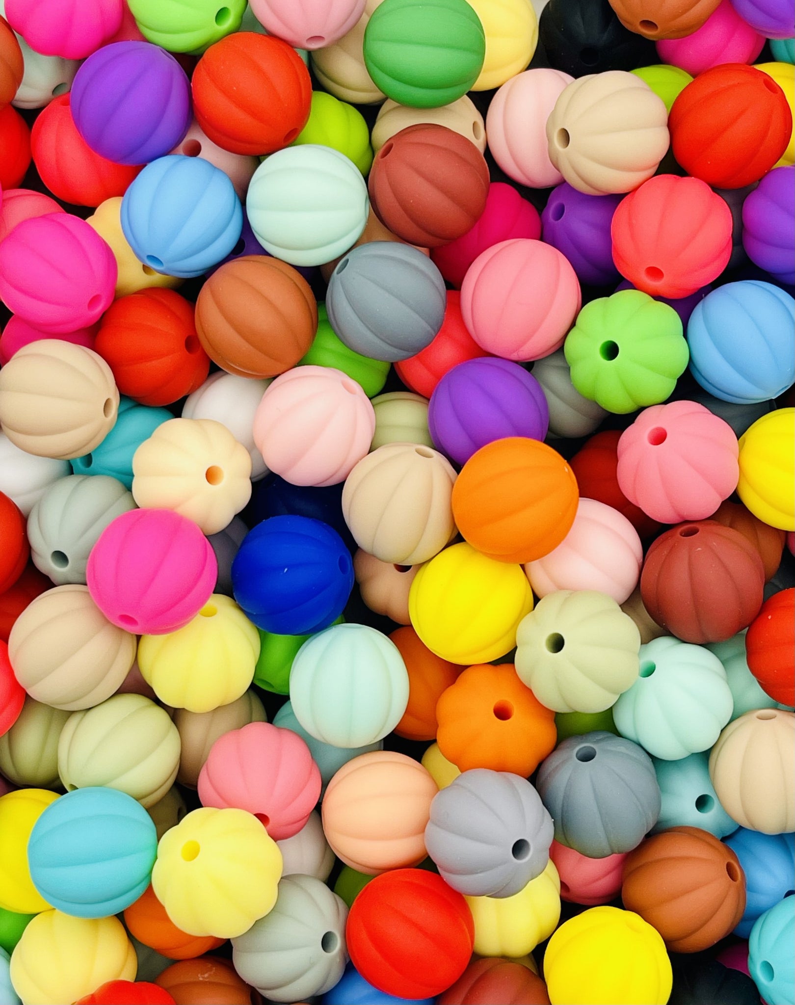 Colorful Silicone Pumpkin Bead Collection: Soft Touch Beads for DIY Crafts & Accessories.